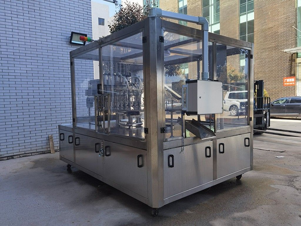 1765004582981630.jpg LG-620 斜嘴袋灌装旋盖机(小).jpg